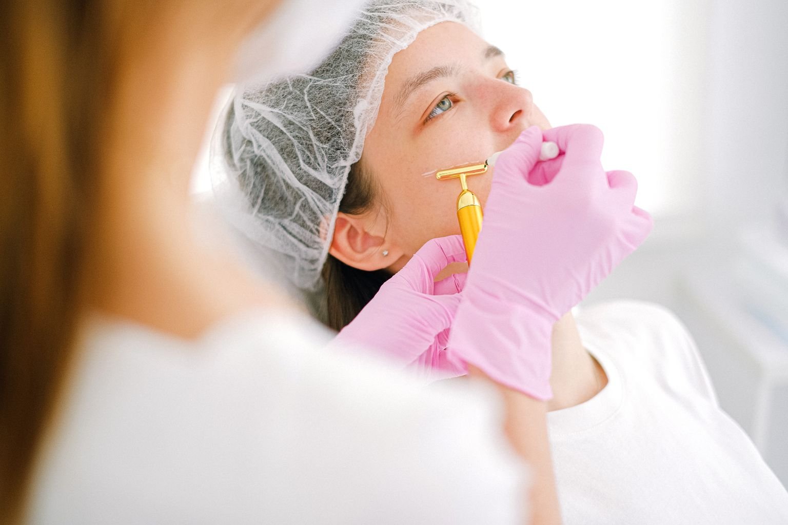 Woman receiving a facial treatment at a Mississauga skin clinic